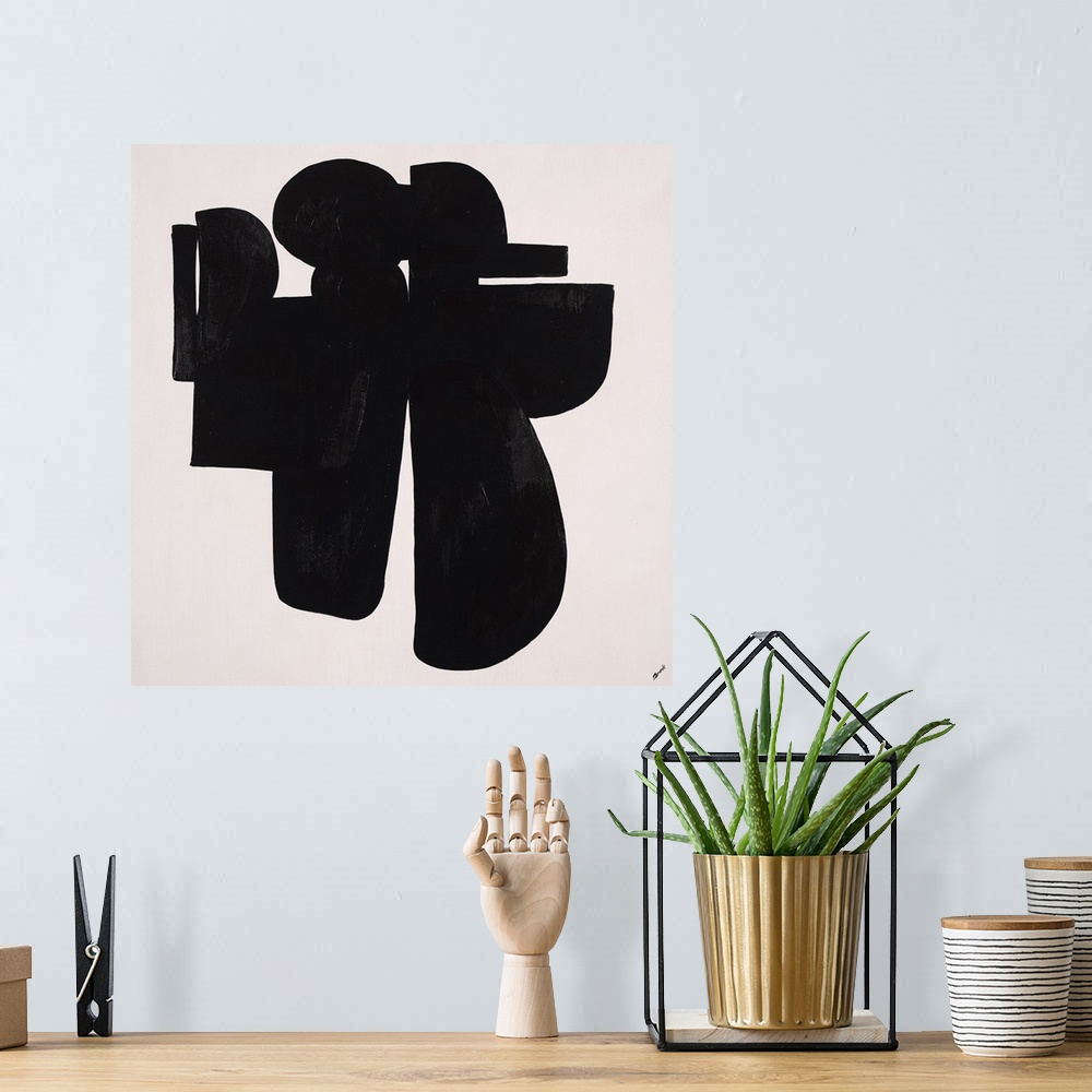 A bohemian room featuring Abstract painting using heavy black paint to make shapes, almost appearing as something in silhou...