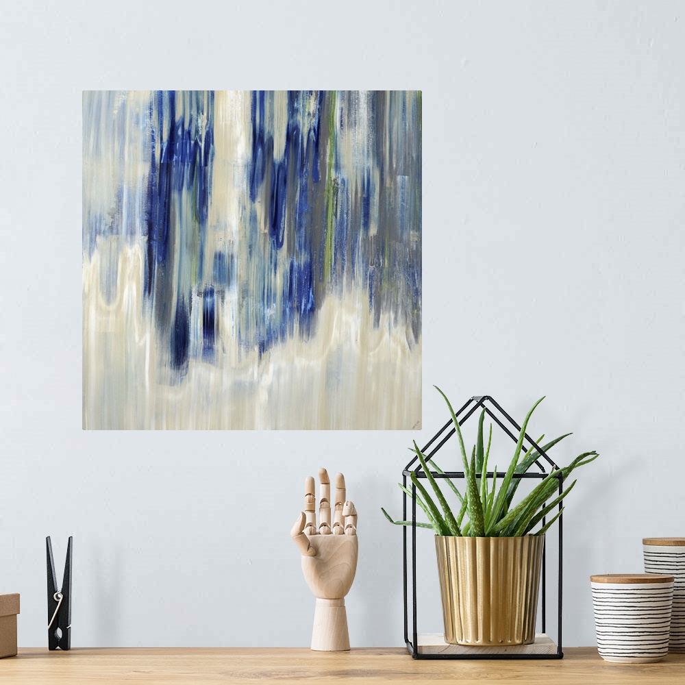 A bohemian room featuring Contemporary abstract painting using blue and neutral tones.