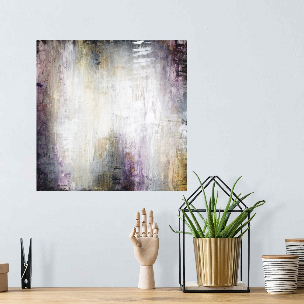 A bohemian room featuring Contemporary abstract artwork with a glowing white center framed by black and purple.