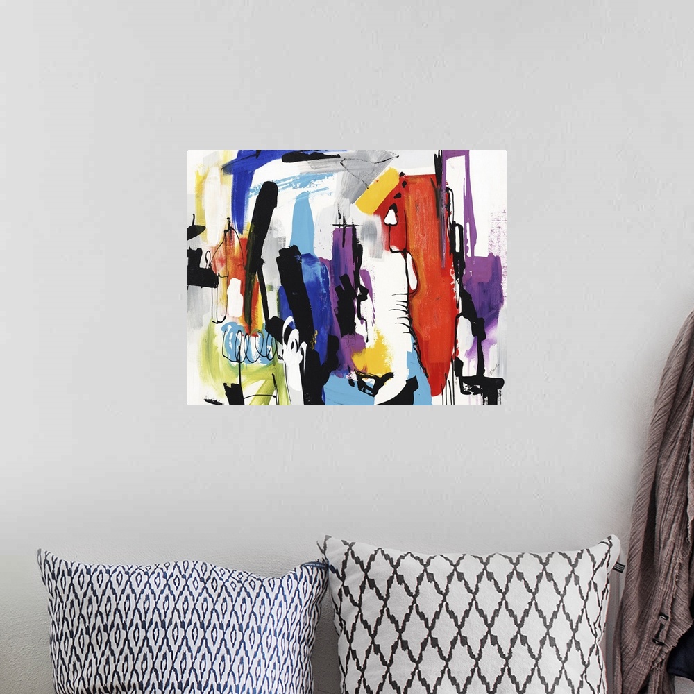 A bohemian room featuring Vibrant abstract painting filled with color and busy brushstrokes in all directions.