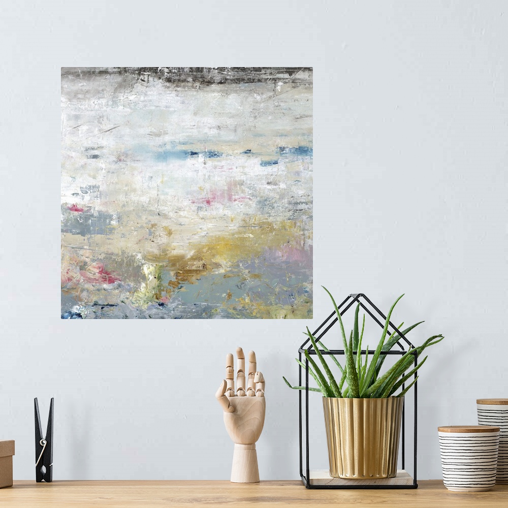 A bohemian room featuring Square abstract painting of textured  colors with accents of lighter colors of pink and yellow.
