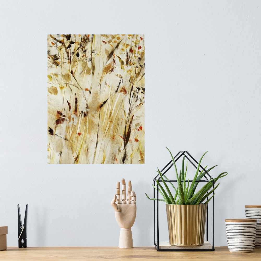 A bohemian room featuring Contemporary painting of warm, golden flowers and leaves on long branches that extend vertically ...