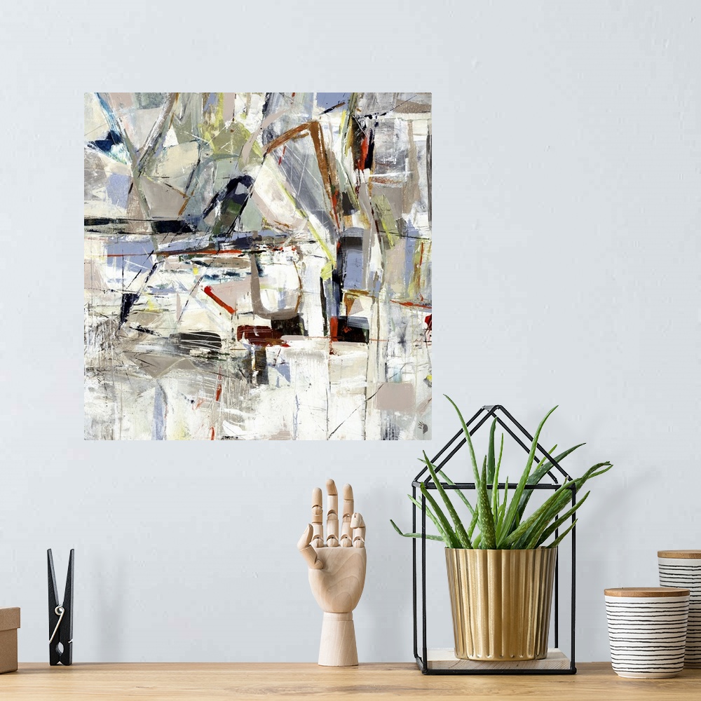 A bohemian room featuring Square abstract painting of angled lines and textured shapes in natural tones.