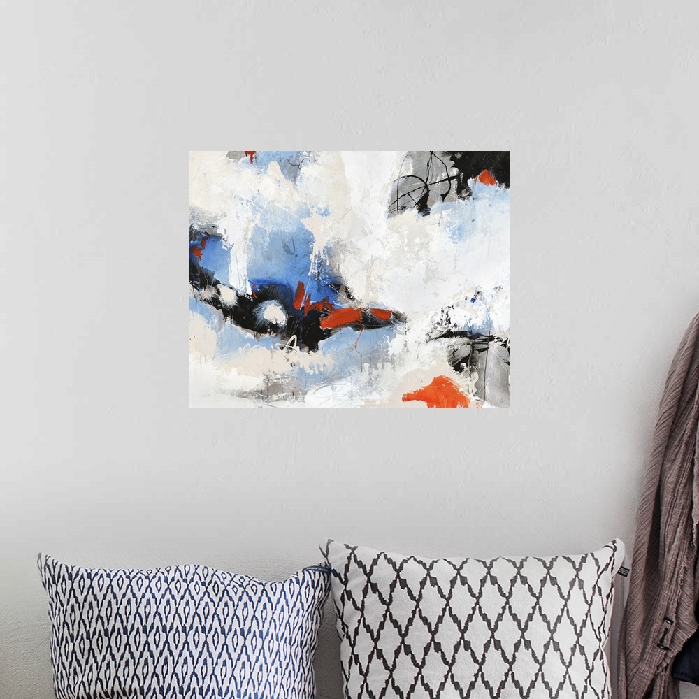 A bohemian room featuring Contemporary abstract painting with blue and red peeking through clouds of white.