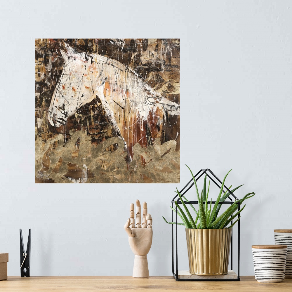 A bohemian room featuring Square abstract painting of a horse silhouette in shades of brown, gold, orange, and white.