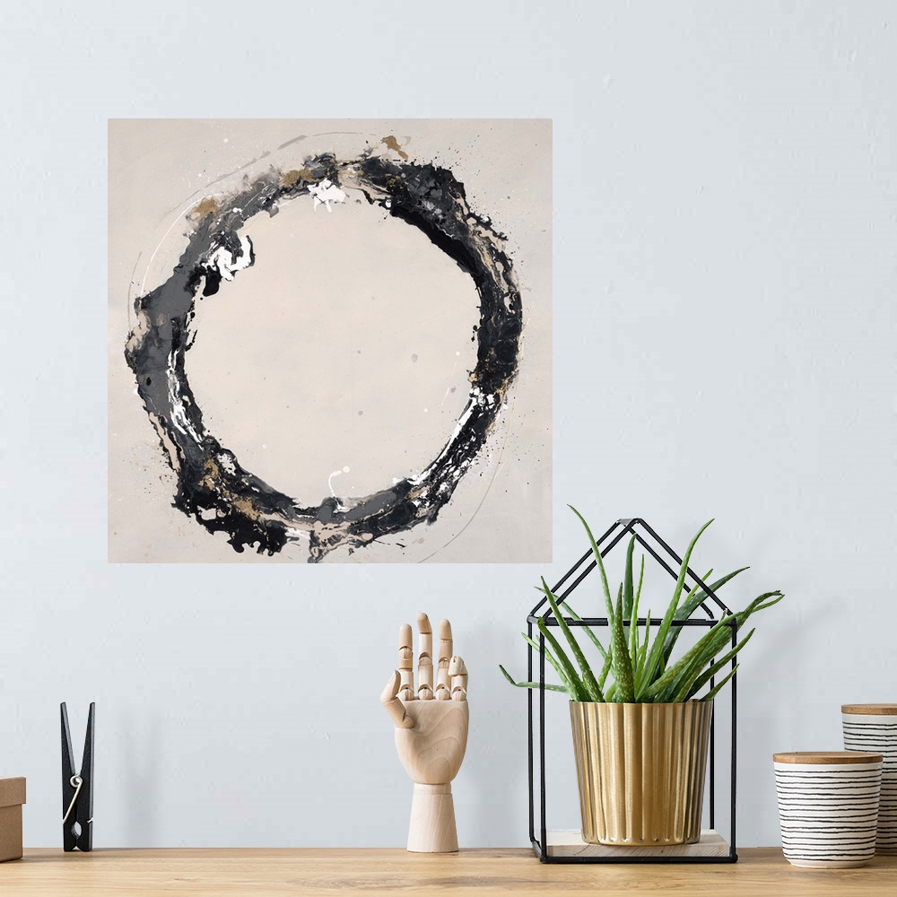 A bohemian room featuring Abstract painting using textured looking gray tones to form a circle on a neutral colored backgro...