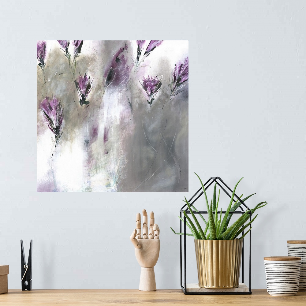 A bohemian room featuring Square painting of abstract lavender colored lilies on a gray and white background.