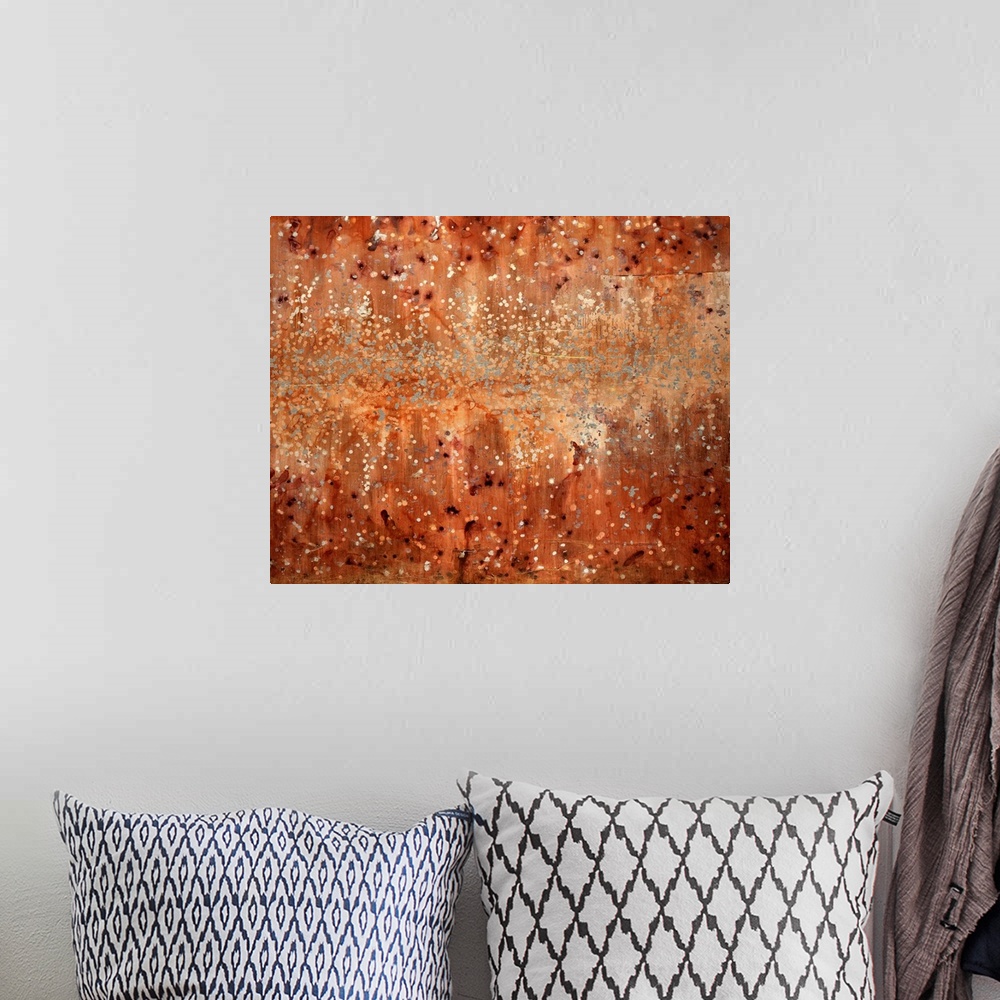 A bohemian room featuring Abstract painting consisting of dots and tiny circles scattered over a neutral background.