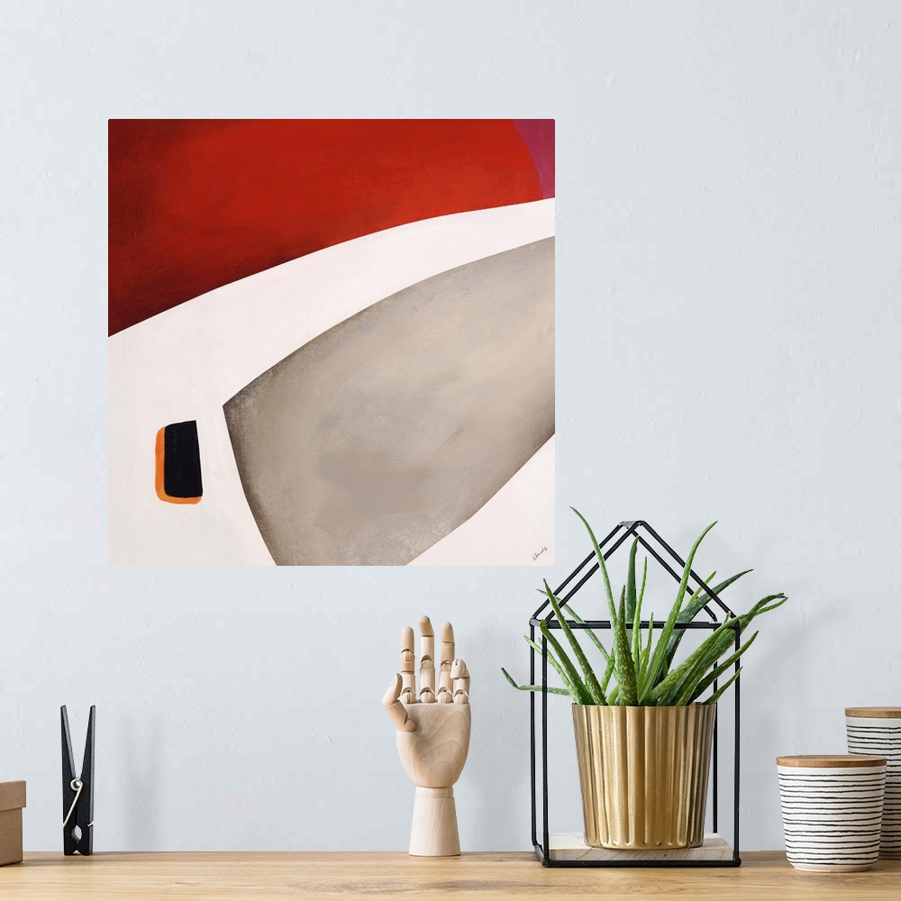 A bohemian room featuring Abstract painting of a portion of a space helmet on a warm background.