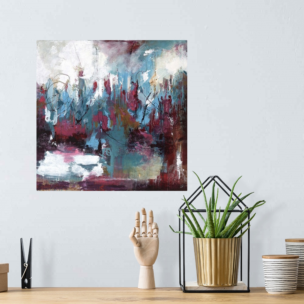 A bohemian room featuring Abstract painting using dark blue and violet colors.