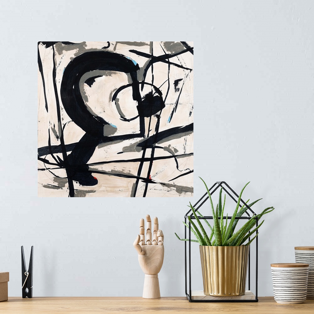 A bohemian room featuring Contemporary abstract painting using bold black lines against a neutral toned background.