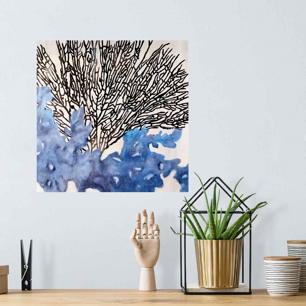 A bohemian room featuring Square abstract painting of various shapes representing coral in the ocean.