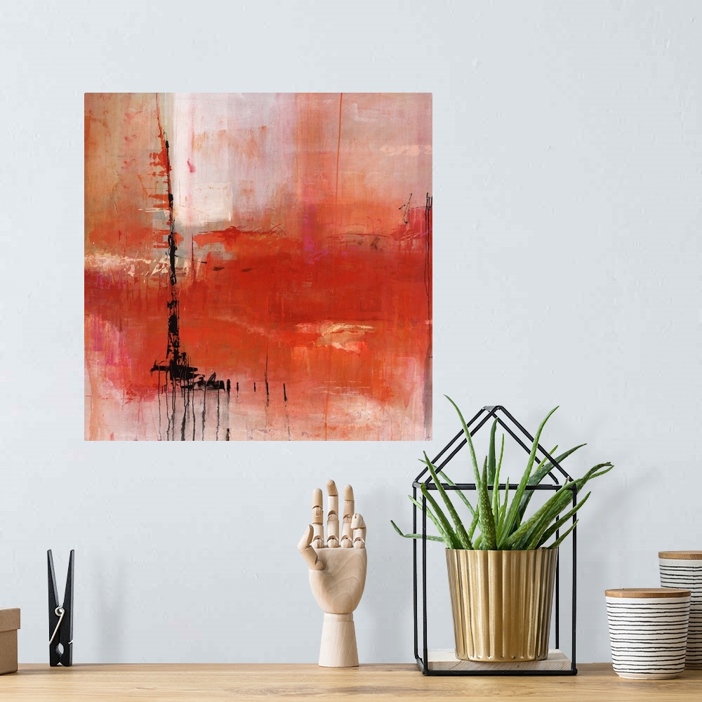 A bohemian room featuring Abstract painting of deep red and pale red tones, with a harsh black stroke off to the left.