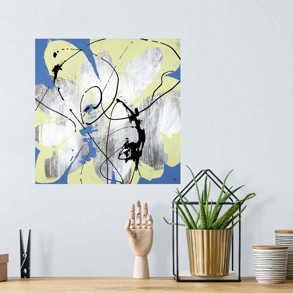 A bohemian room featuring A lively abstract painting of a flower in shades of yellow and blue.