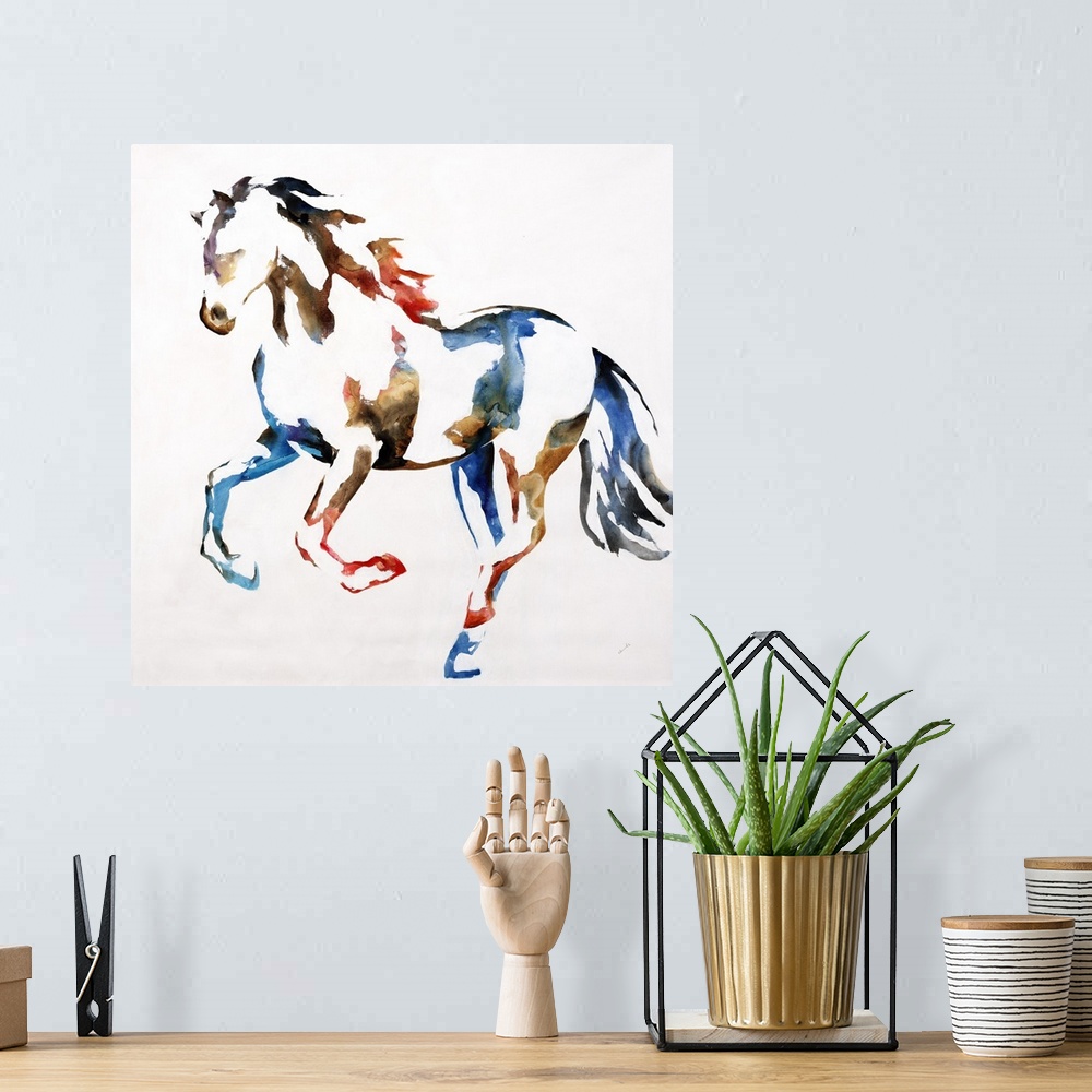 A bohemian room featuring Square artwork with a colorful silhouette of a horse on a white background.