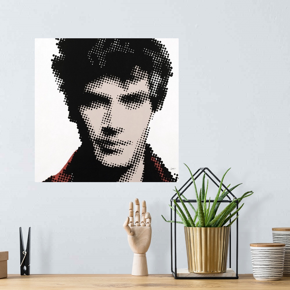 A bohemian room featuring Square illustration of a man's face created with black dots over beige and red paint on a white b...