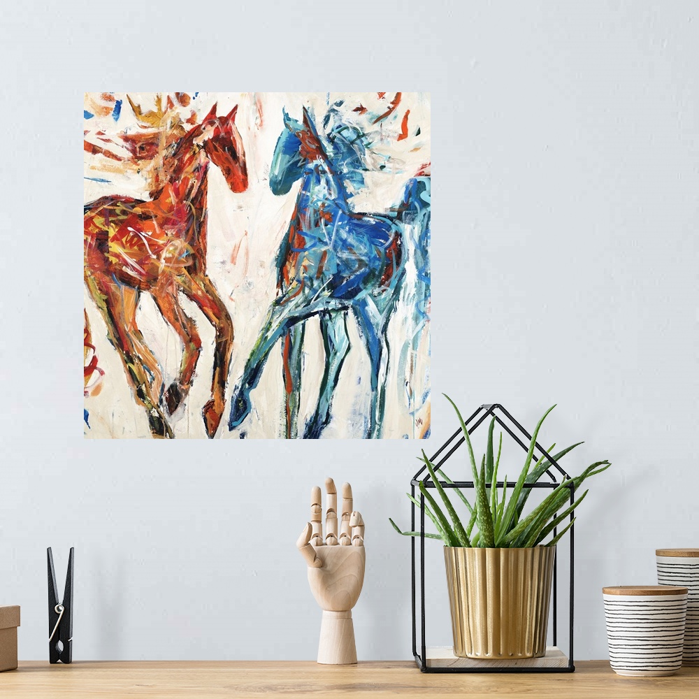 A bohemian room featuring Contemporary painting of a red and a blue horse.