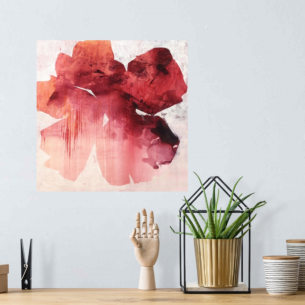 A bohemian room featuring Contemporary abstract painting using a vibrant and faded red against a neutral background.