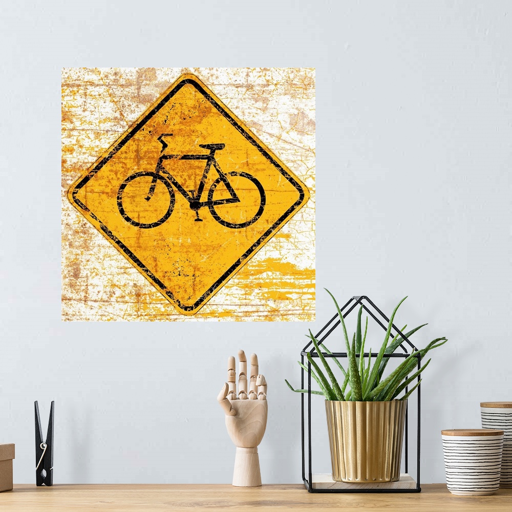 A bohemian room featuring A worn, distressed, cracked and rusty Bike street sign.