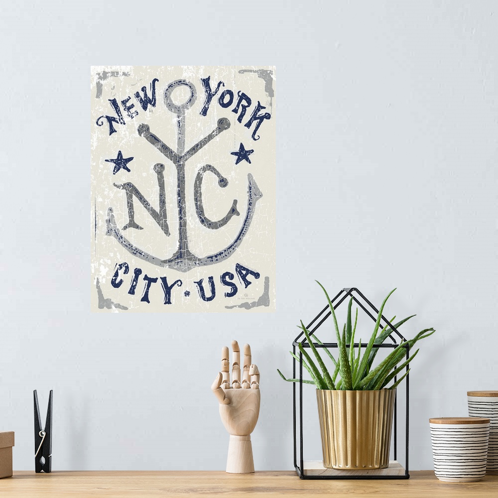A bohemian room featuring Illustrated vintage, worn artwork of an anchor and typography that reads New York City, USA.