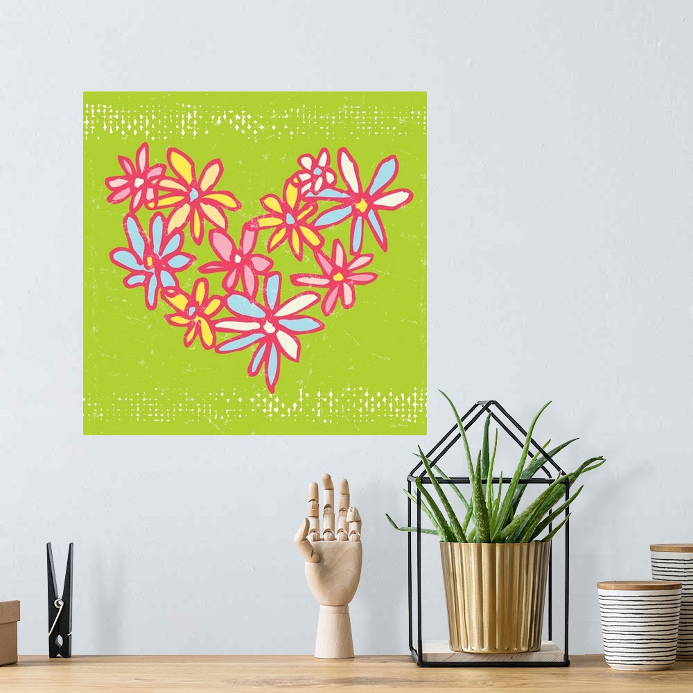 A bohemian room featuring A pen and ink illustrated heart made out of colored daisies on a green background.