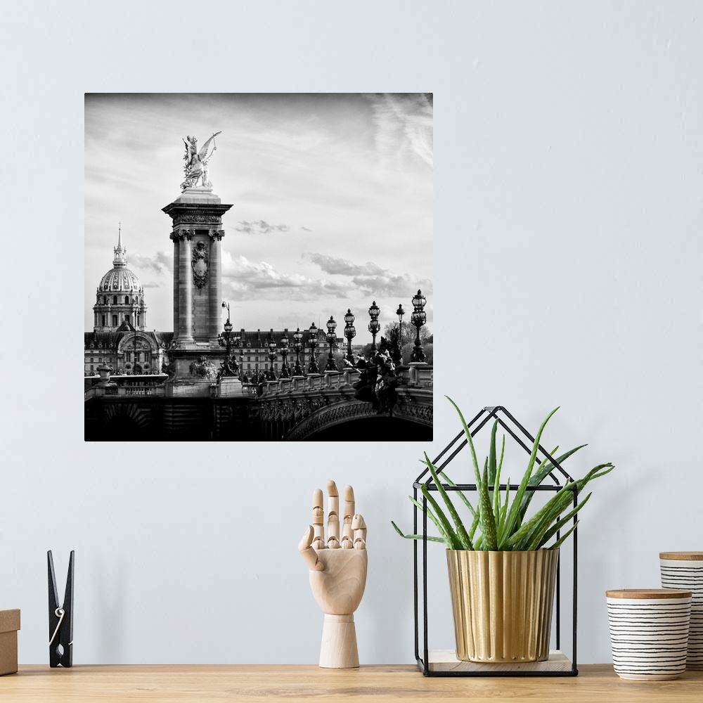 A bohemian room featuring Black and white photo of a statue on the Pont Alexandre III in Paris, France.