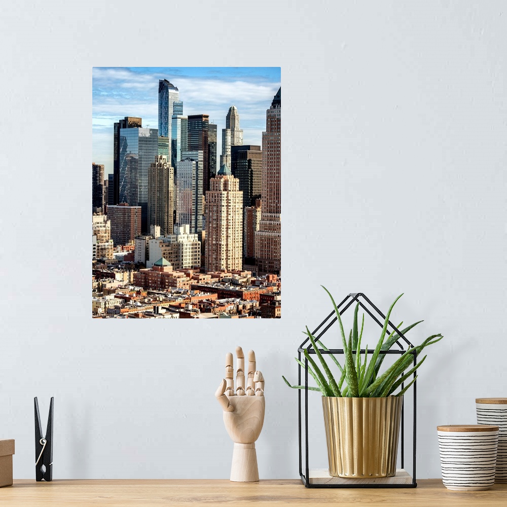A bohemian room featuring A photograph of a group of skyscrapers in New York city.