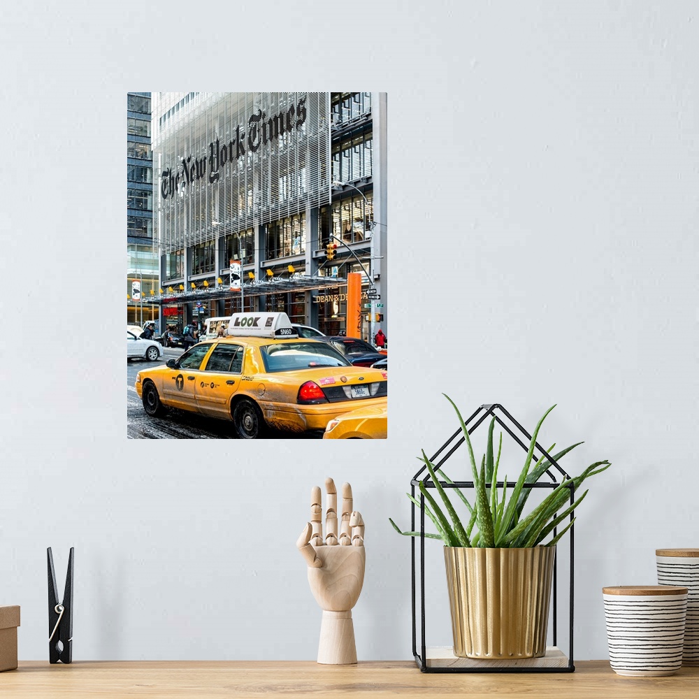 A bohemian room featuring A photograph of NYC taxi's in front of the New York Times building.