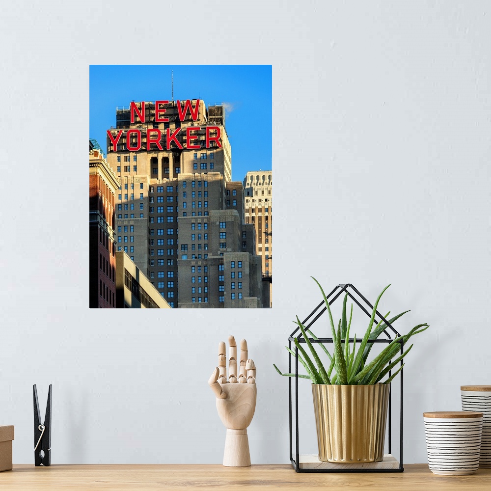 A bohemian room featuring A photograph of the New Yorker building in New York city.