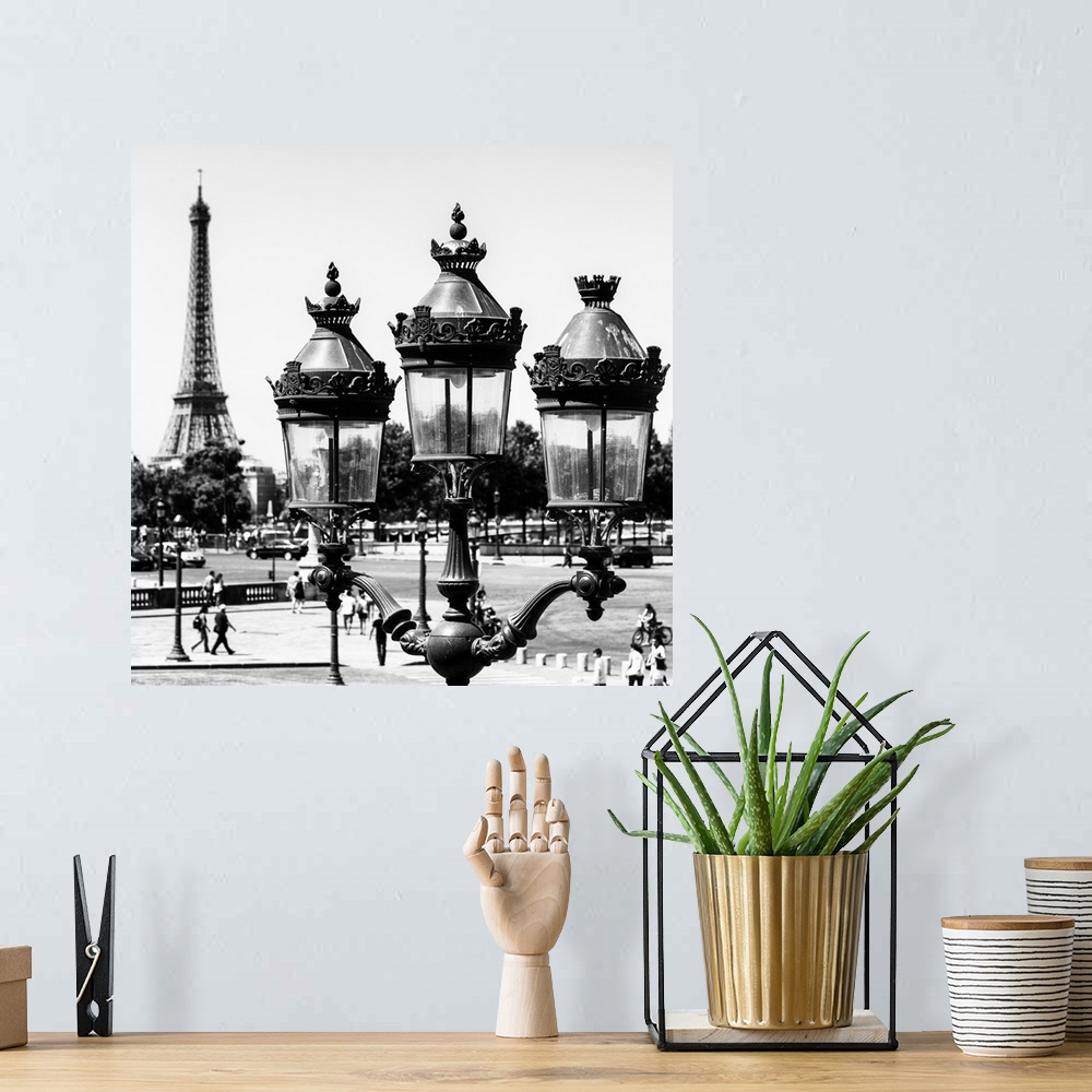 A bohemian room featuring A photograph of an ornately decorated Parisian lamppost.