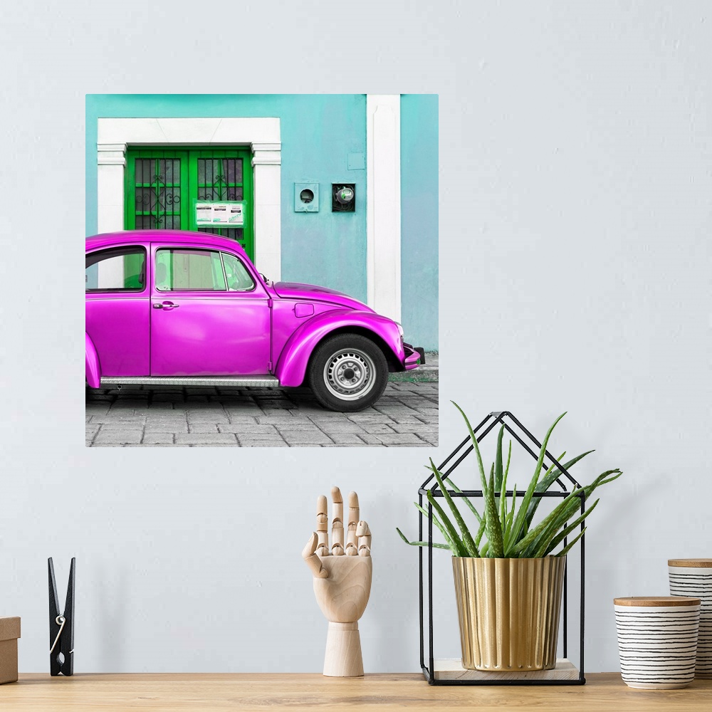 A bohemian room featuring Square photograph of a classic Volkswagen Beetle parked in front of a turquoise building with a b...