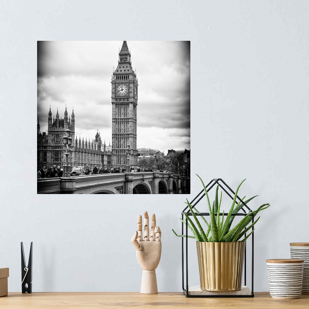 A bohemian room featuring Black and white photo with dramatic lighting of the Big Ben clock tower.