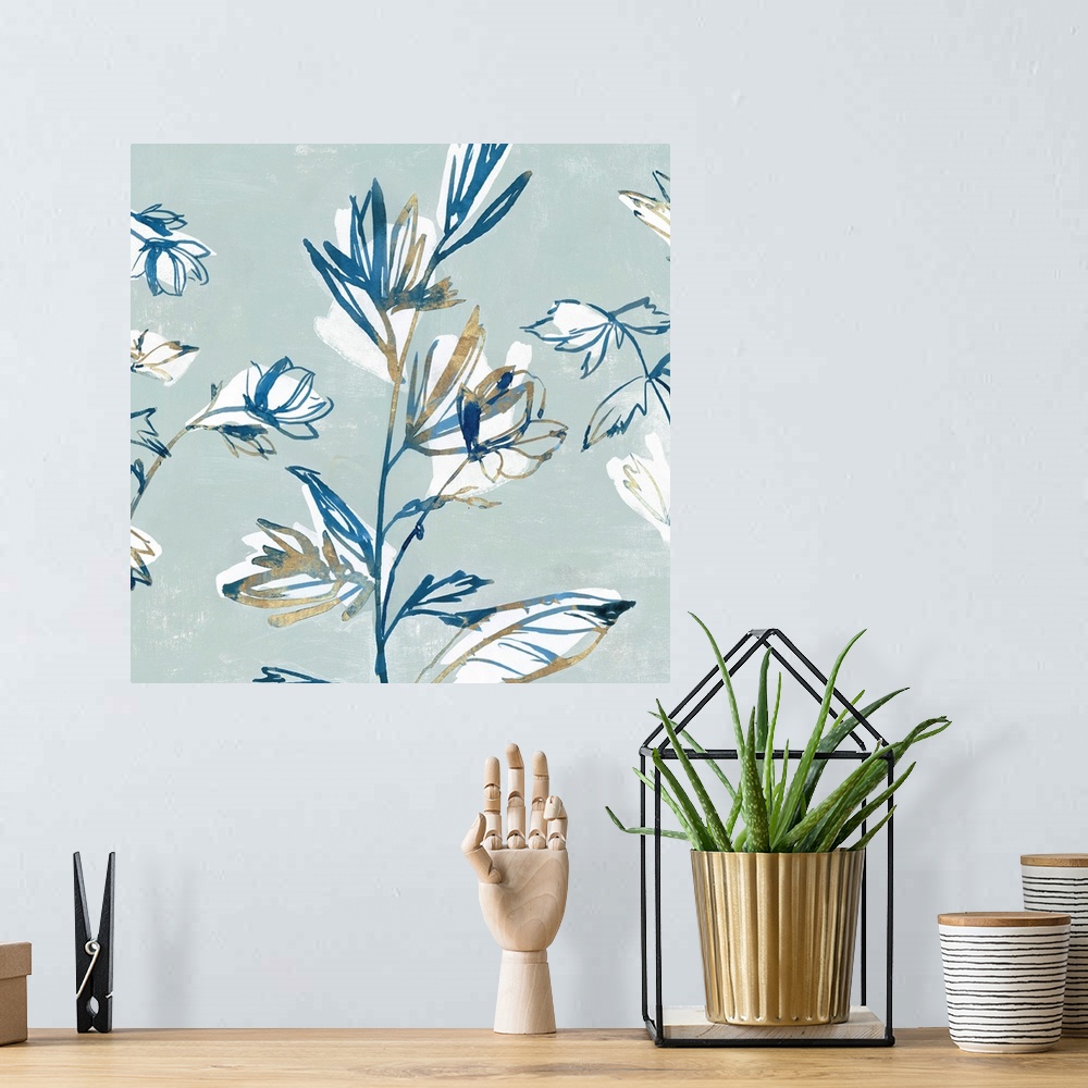 A bohemian room featuring Watercolor flowers painted in various blue tones.