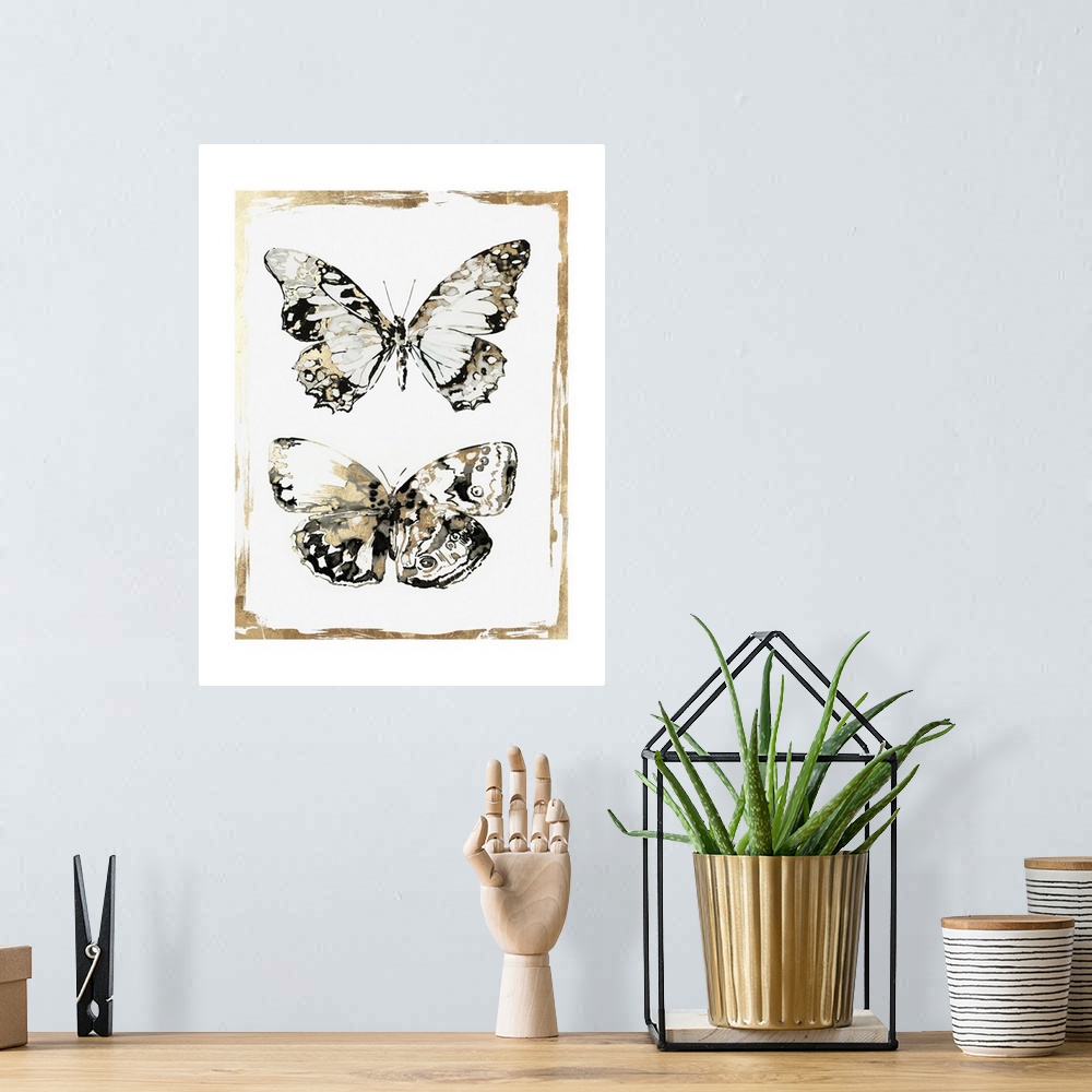 A bohemian room featuring Glamorous butterfly decor in black, white, and gold.