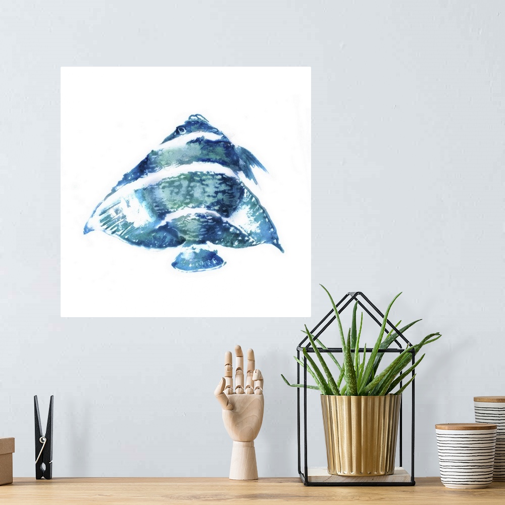 A bohemian room featuring Blue-toned watercolor painting of a tropical fish on white.