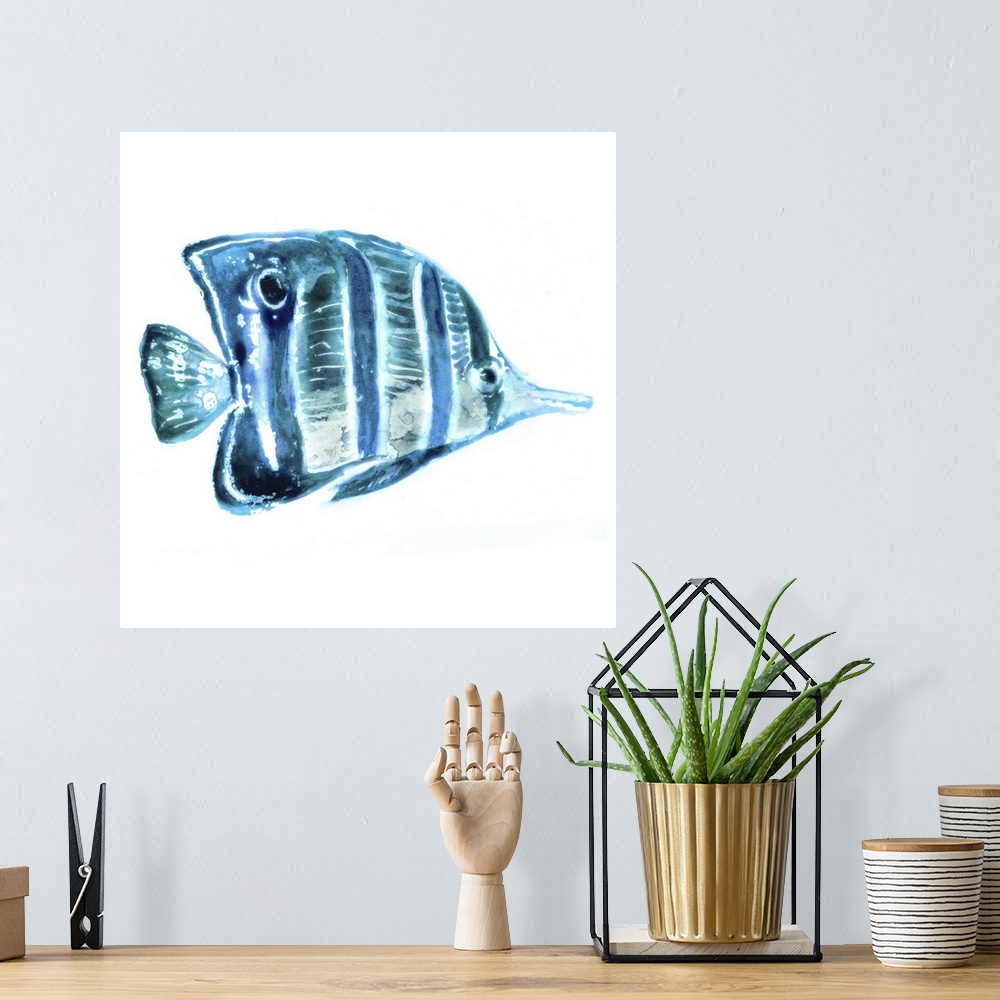 A bohemian room featuring Blue-toned watercolor painting of a tropical fish on white.
