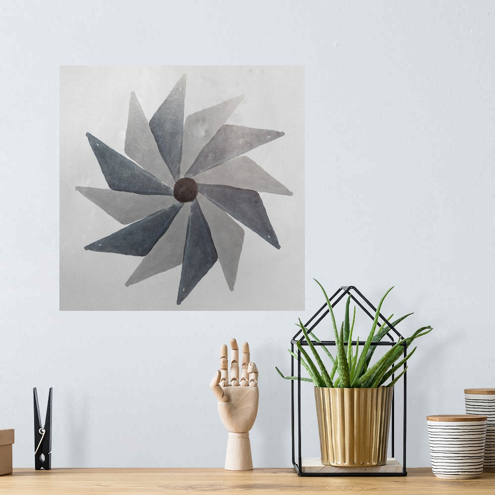 A bohemian room featuring Abstract pinwheel shape in shades of grey.