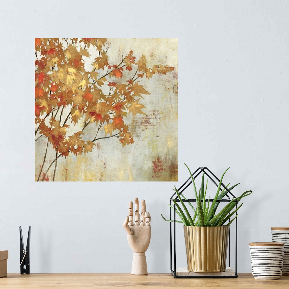 A bohemian room featuring Contemporary home decor artwork of golden foliage against a neutral background.