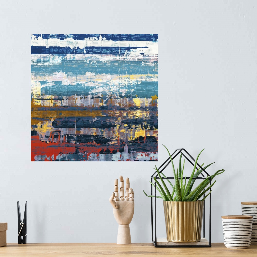 A bohemian room featuring Contemporary abstract home decor artwork using blues and reds in distressed conditions.