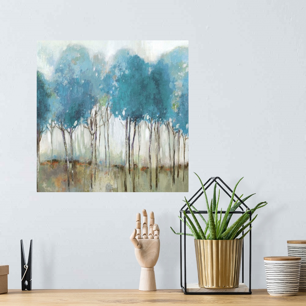 A bohemian room featuring Abstract landscape of a meadow with trees painted in robin's egg blue.