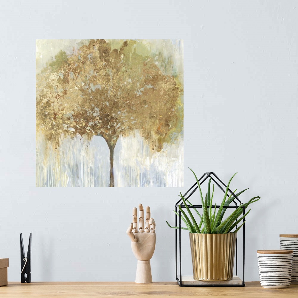 A bohemian room featuring An abstract painting of a single tree with gold accents in the leaves