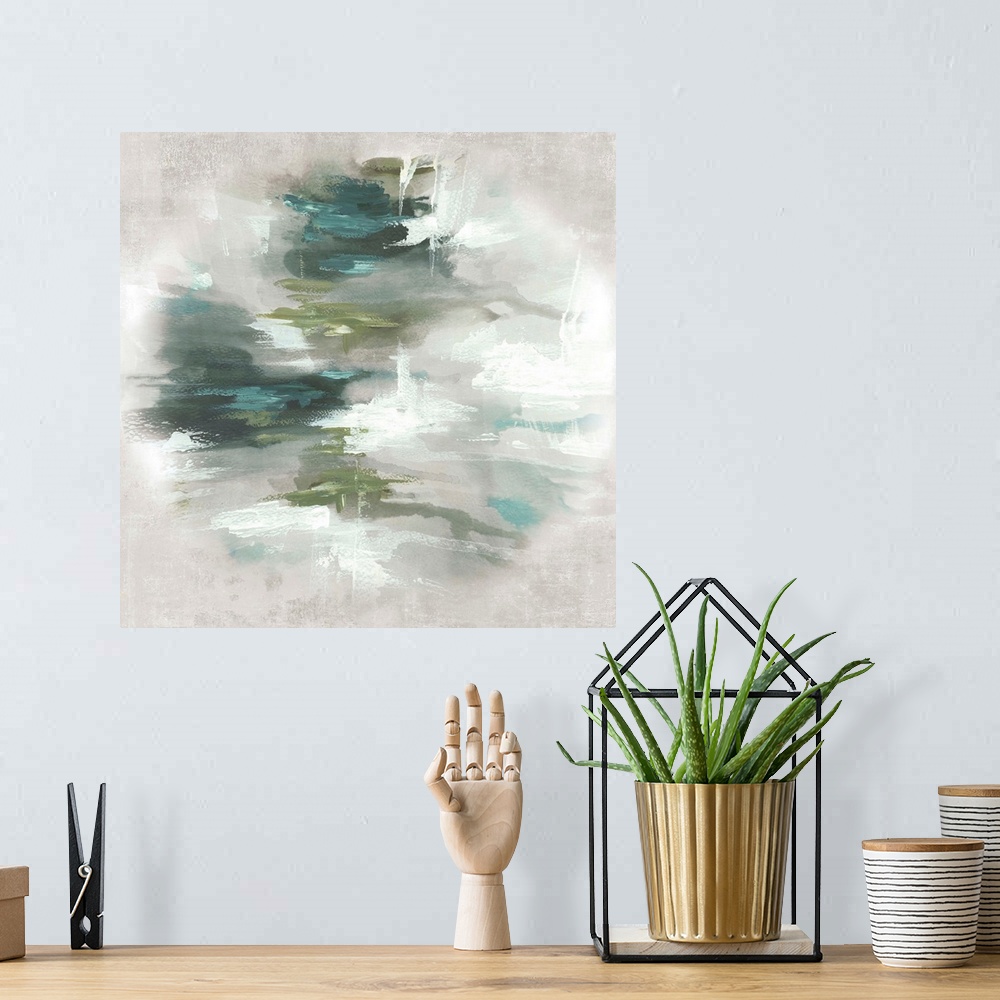 A bohemian room featuring Abstract artwork with different shades of green in the center that fades to a light gray.