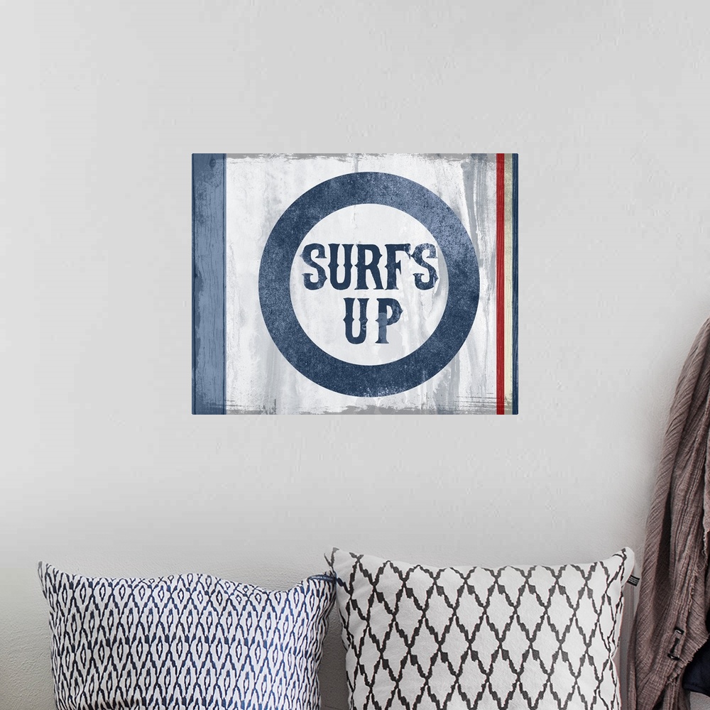 A bohemian room featuring Red and blue surfing sign with "Surf's Up" printed on.