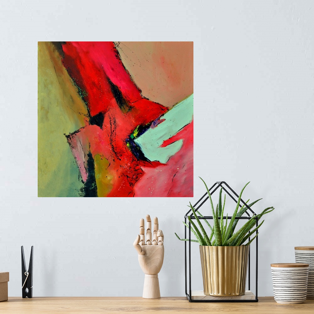 A bohemian room featuring Abstract painting with vibrant hues in shades of red, yellow, blue and white mixed in with black ...