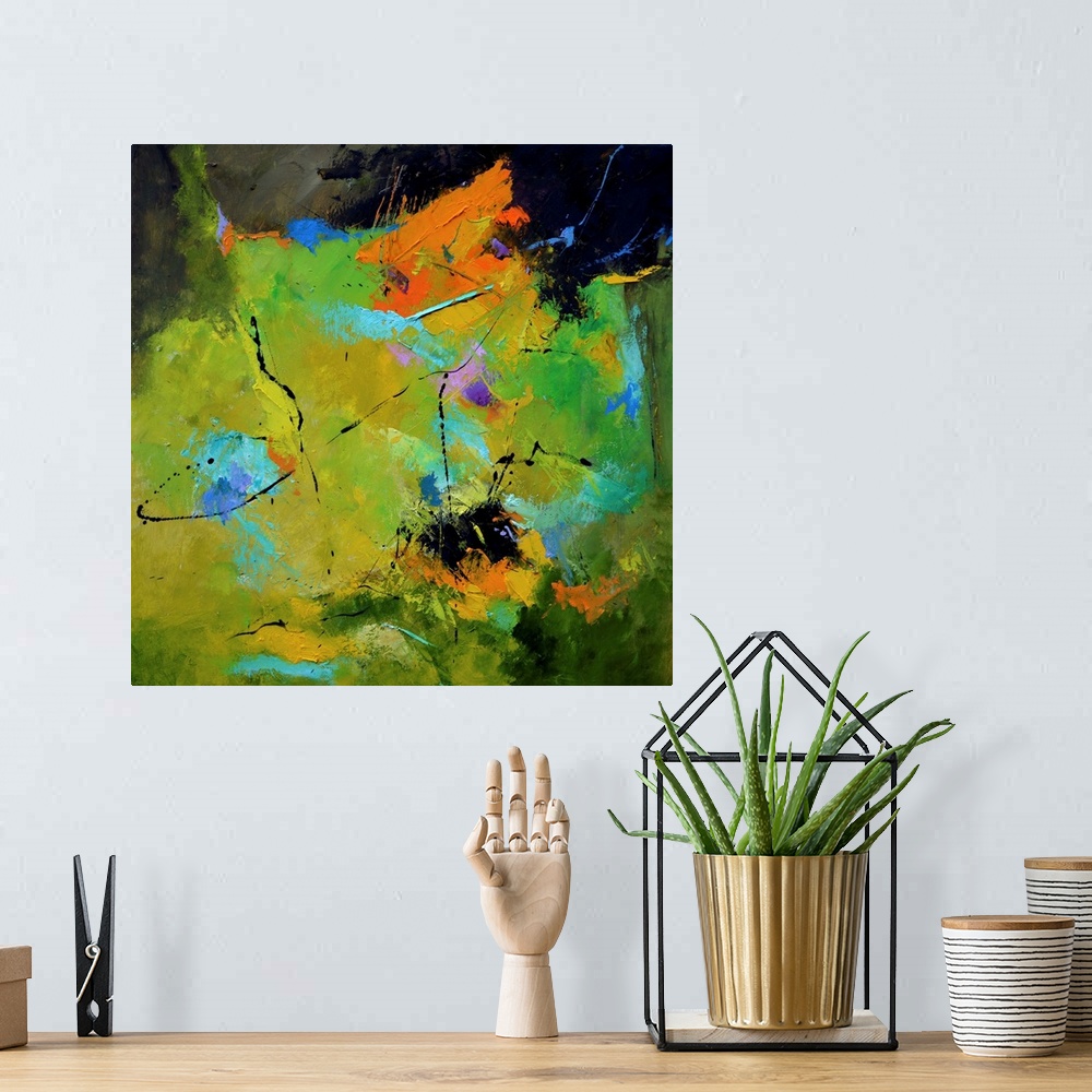 A bohemian room featuring A square abstract painting in textured shades of green, blue and orange with splatters of paint o...