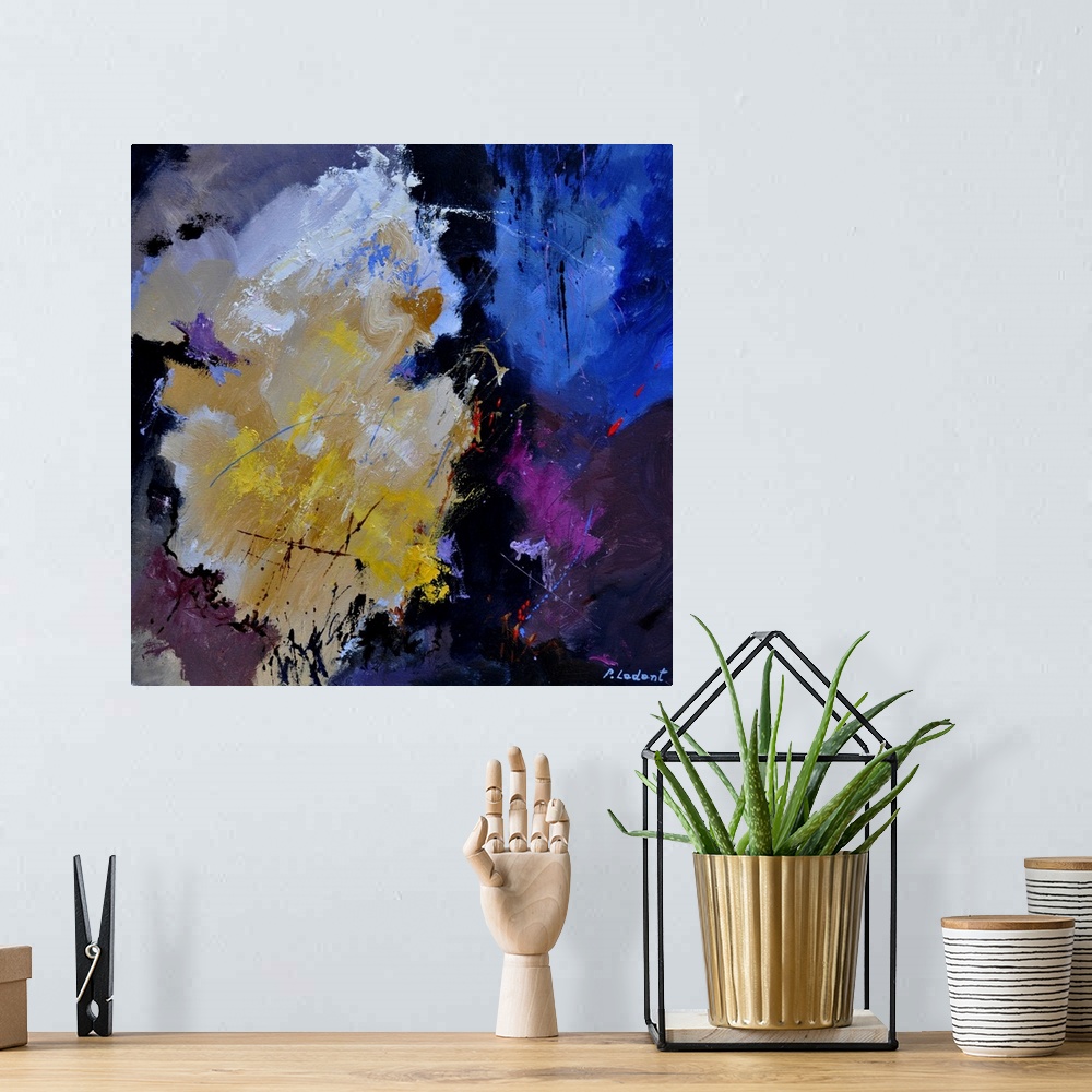A bohemian room featuring Abstract painting with darken hues in shades of yellow, blue, purple, and white mixed in with bla...