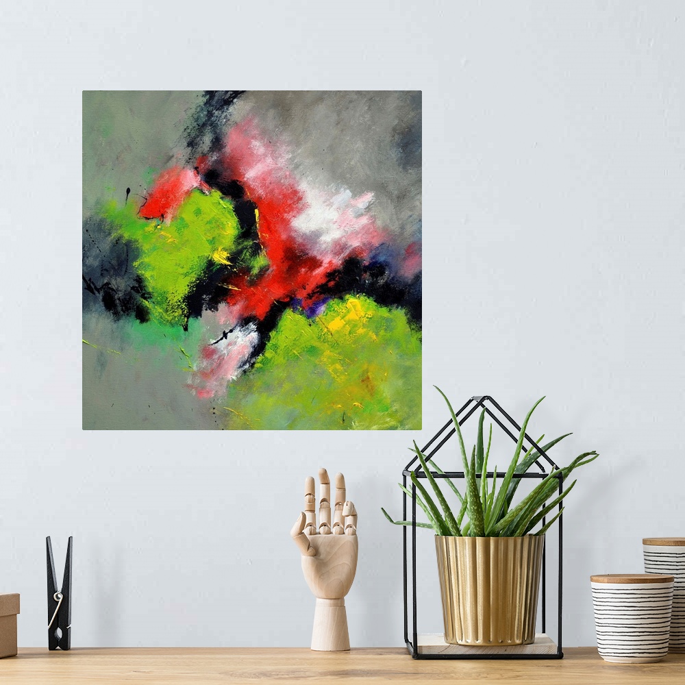 A bohemian room featuring A square abstract painting with deep textured colors of green and red.
