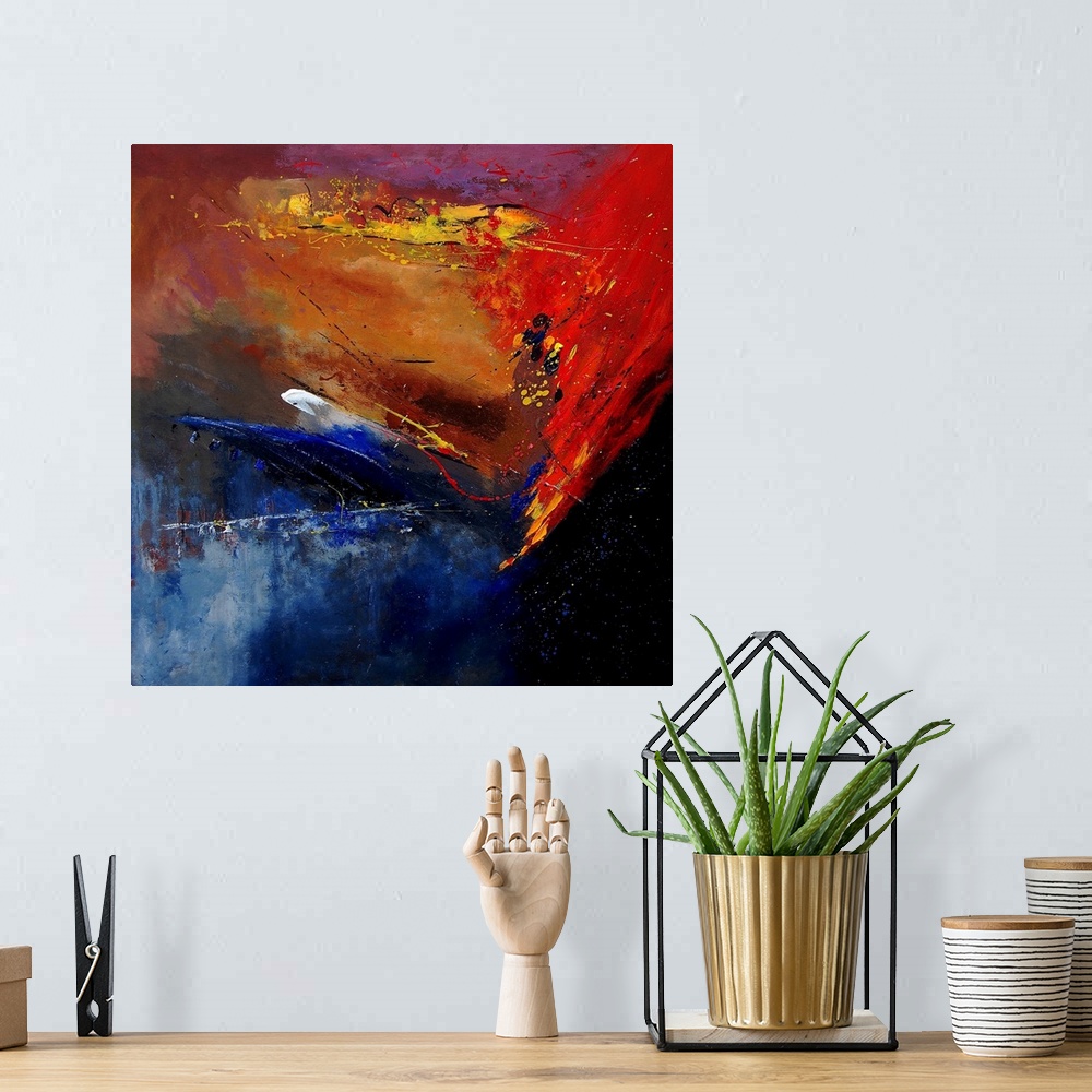 A bohemian room featuring A horizontal abstract painting of vibrant colors of yellow, red and blue in bold brush strokes an...