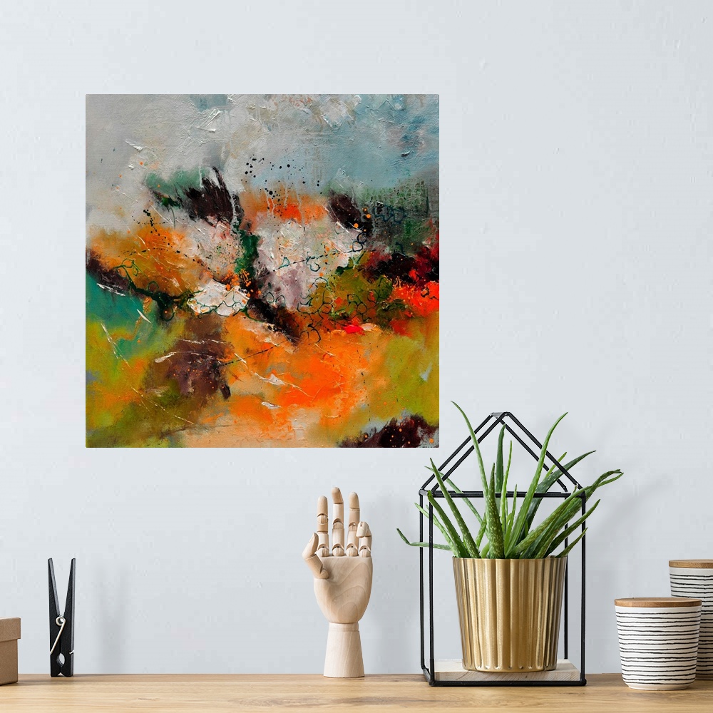 A bohemian room featuring A square abstract painting in textured shades of brown, orange, green and yellow with splatters o...