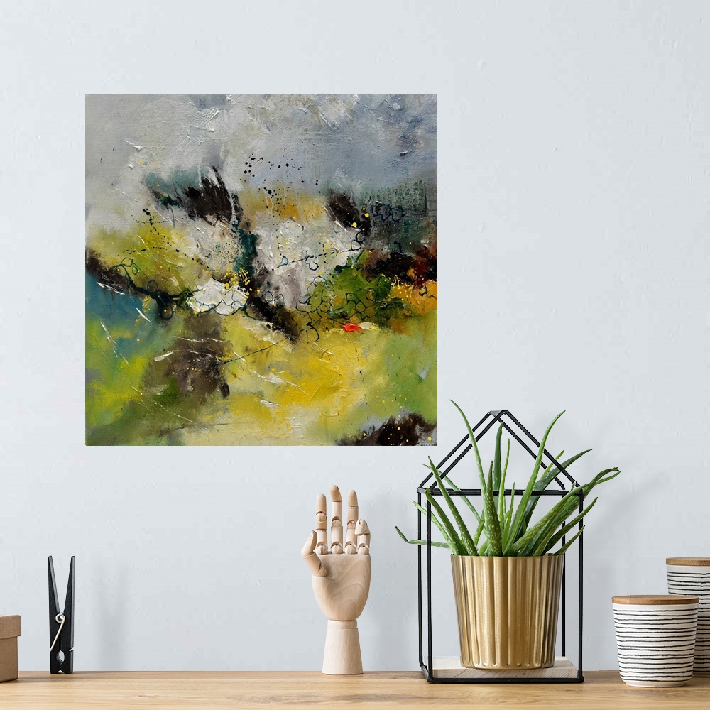 A bohemian room featuring A square abstract painting in textured shades of gray, brown, green and yellow with splatters of ...